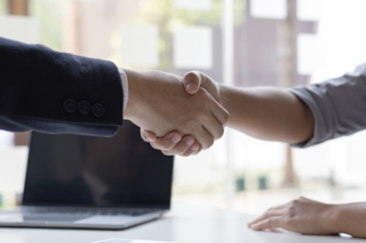Shaking hands at a job interview